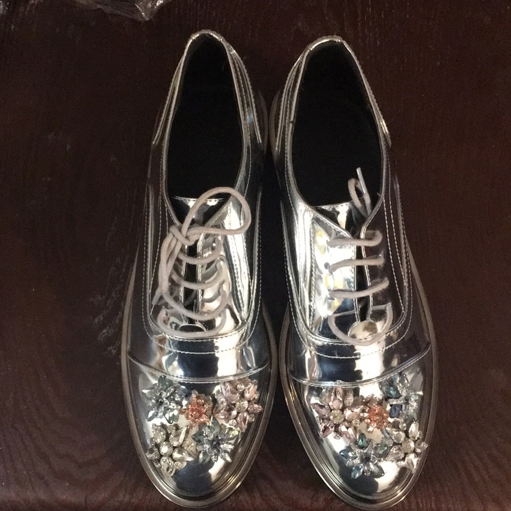 Silver embellished shoes